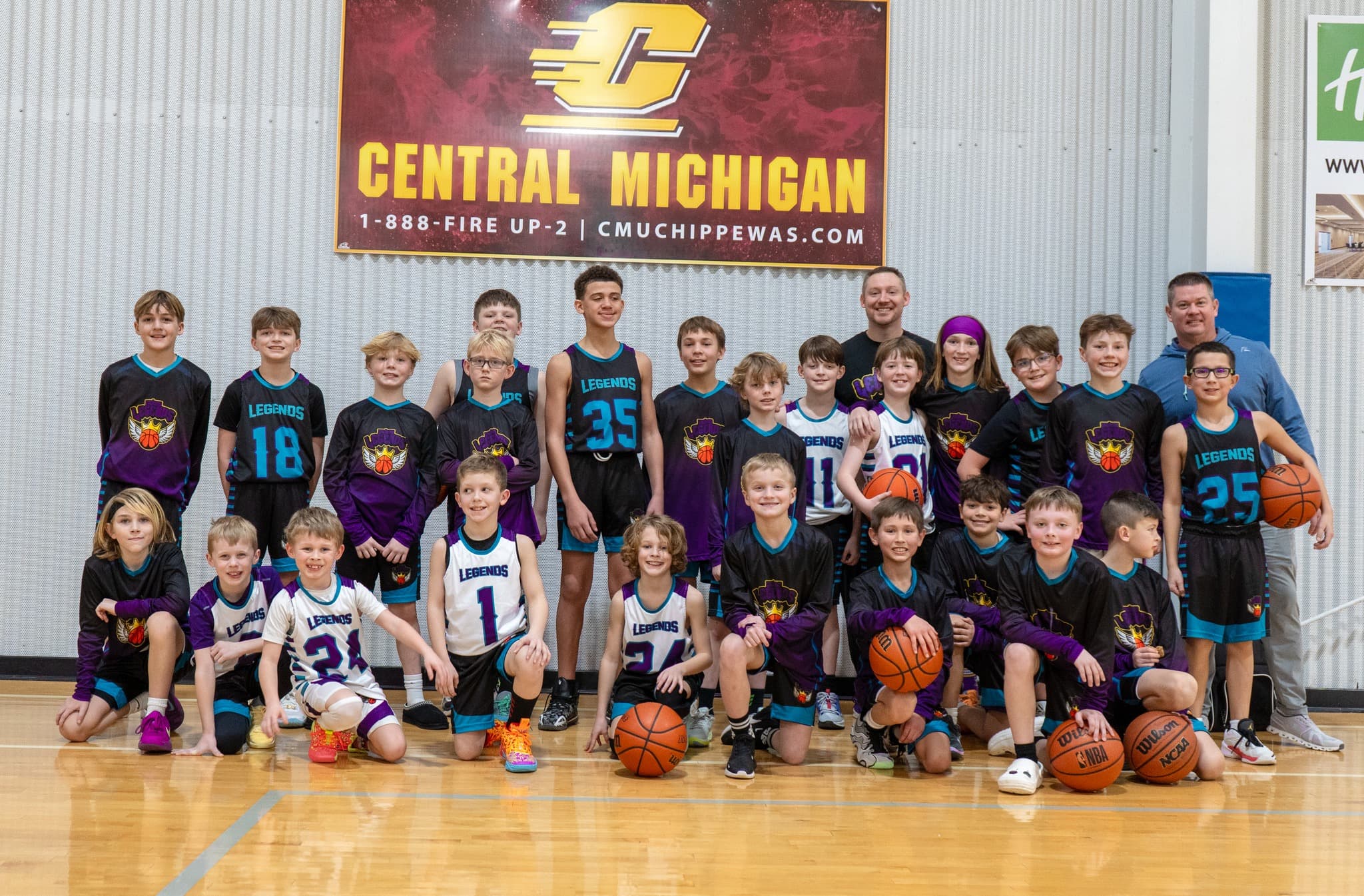 The full Legends program — players and coaches at a tournament in Michigan